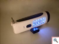 Επαναφορτιζόμενος Φακός Πολλαπλών Λειτουργιών με LED + Ραδιόφωνο